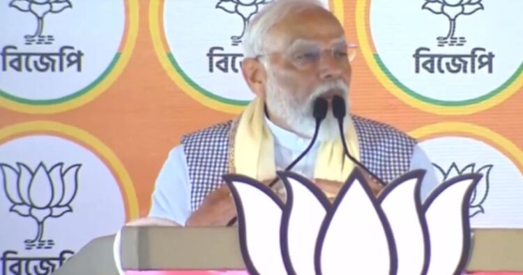 pm-modi-lashed-out-at-tmc-left-congress-in-jalpaiguri