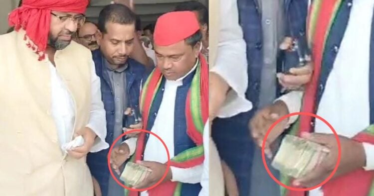 video-of-sp-candidate-bhim-nishad-distributing-bundles-of-notes-goes-viral