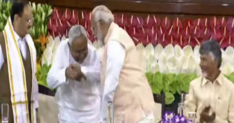 when-nitish-kumar-bent-down-to-touch-narendra-modis-feet-know-what-happened-next